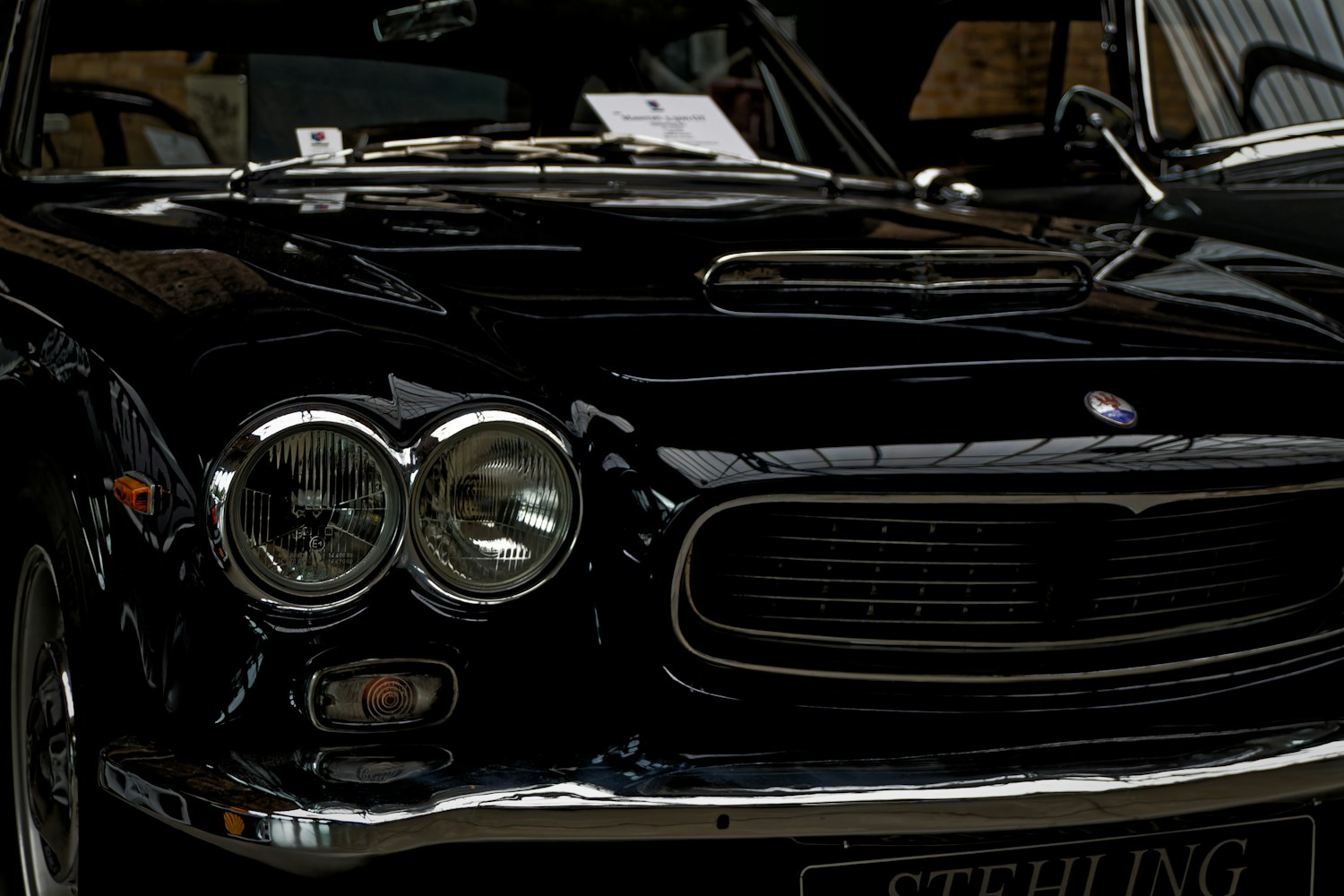Black car front with dark trim