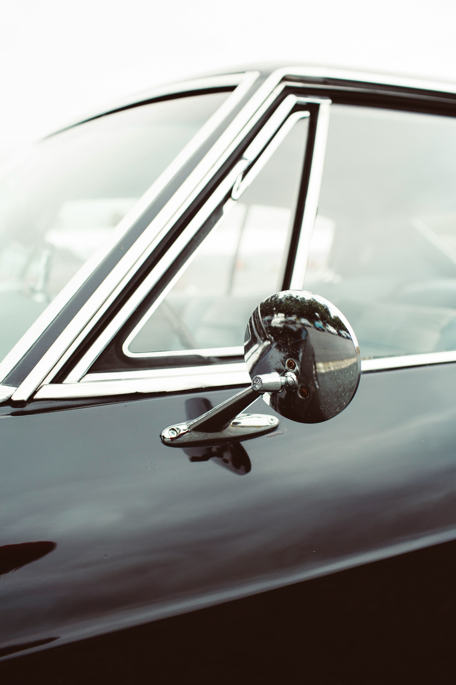 Dark car window and body detail